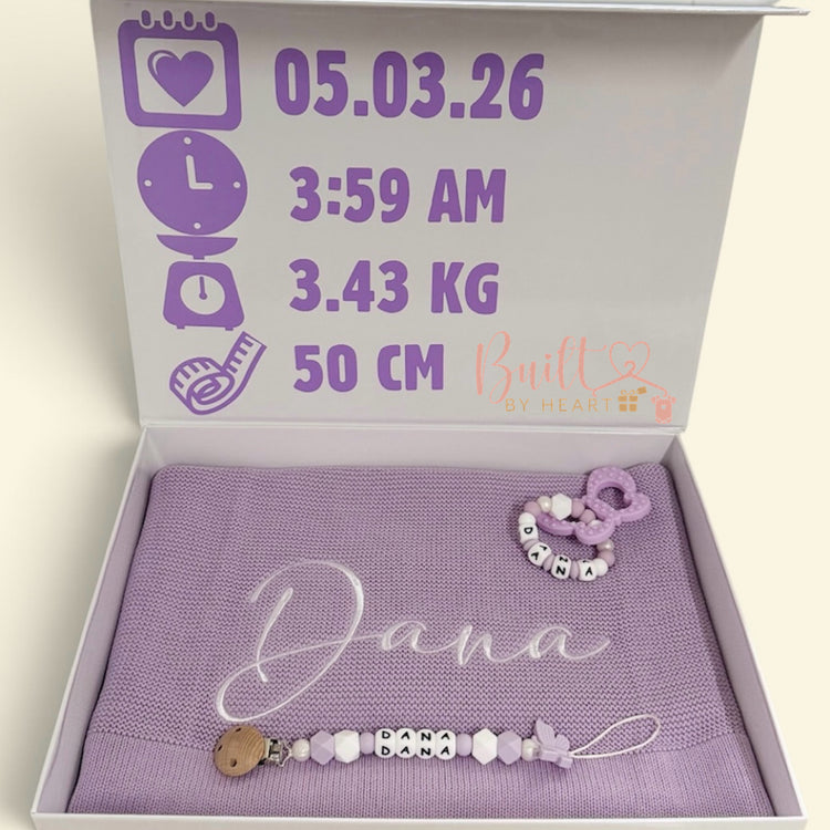 Personalised lilac newborn gift box with embroidered name blanket, matching dummy clip and birth statistics