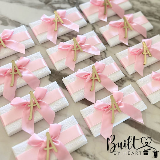 12x Pink Theme Initial & Bow Chocs