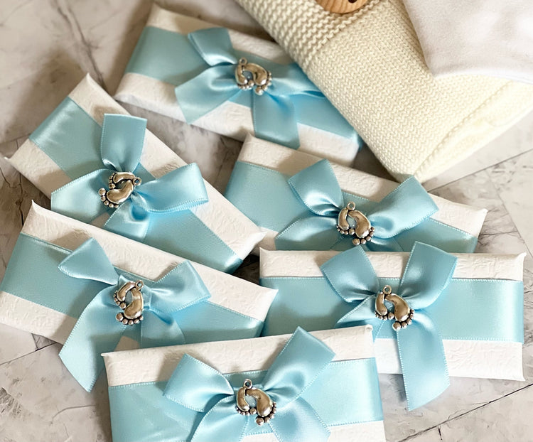 12x blue bow & feet charm chocs